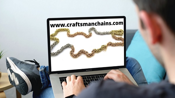 multi-coloured handmade 9ct gold chain disaplyed on laptop domain is for sale