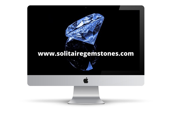 Phenominal solitaire diamond on abstract background advertising solitairegemstones.com is for sale on desktop pc screen